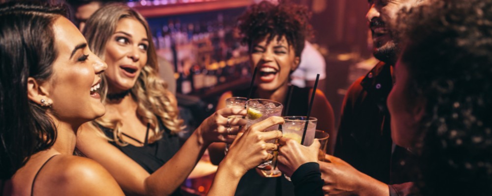 Students drinking and dancing in a Reading Club